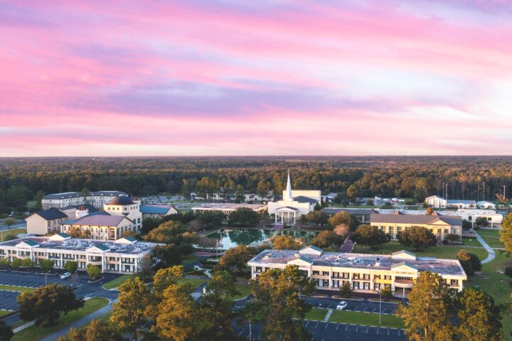 A view of the whole campus with a beautiful sunset
