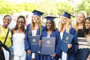CSU students gather with family and friends after receiving their diplomas