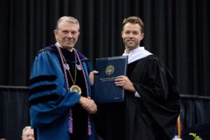 John Osborne receives distinguished service award