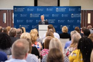 Dondi Costin leads a prayer service