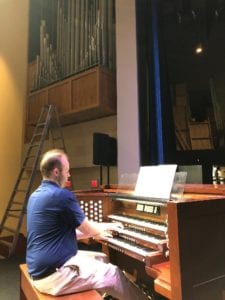 Matthew Swingle plays the organ in Lightsey Chapel to test the pipes.