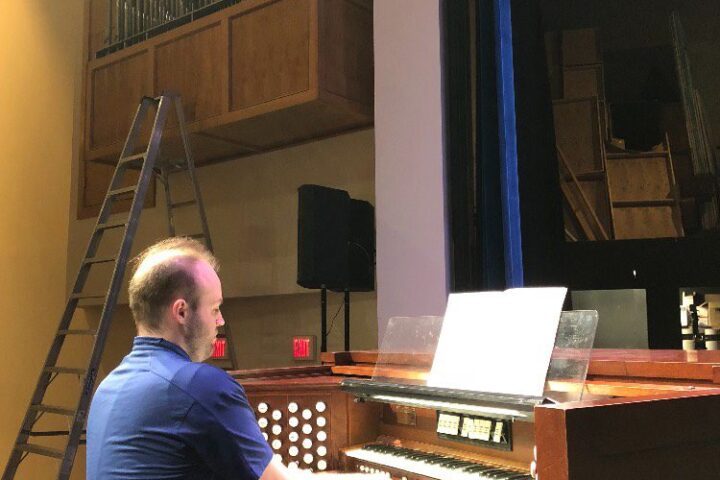 Matthew Swingle plays the organ in Lightsey Chapel to test the pipes.