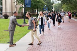 President Costin greets CSU students during Welcome Week 2019.