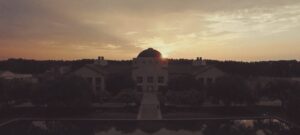 CSU's Science Building with the sun setting behind it.