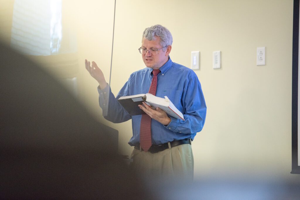 Ryan Gimple reading a textbook