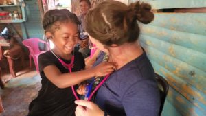 Caroline Home visit to a child