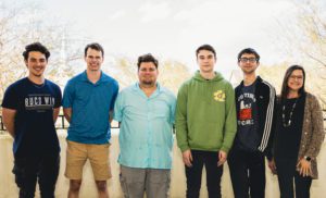 The cybersecurity team, taking a groups picture outside