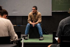 The theatre Professor Keating explains something to students