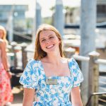 close up image of student smiling at camera