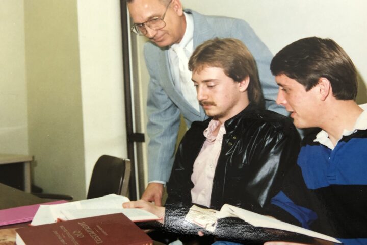 Dr. S.M. Mayo works with students in an Old Testament Survey class.