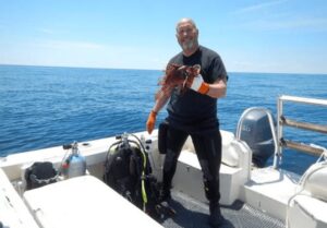 The state of Florida has crowned Ken Ayers Jr. ’78 of Panama City Lionfish King for the second time.