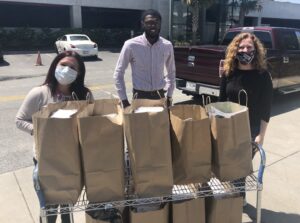 Kevin Jacques and Valerie Sessions delivering meals at the VA hospital