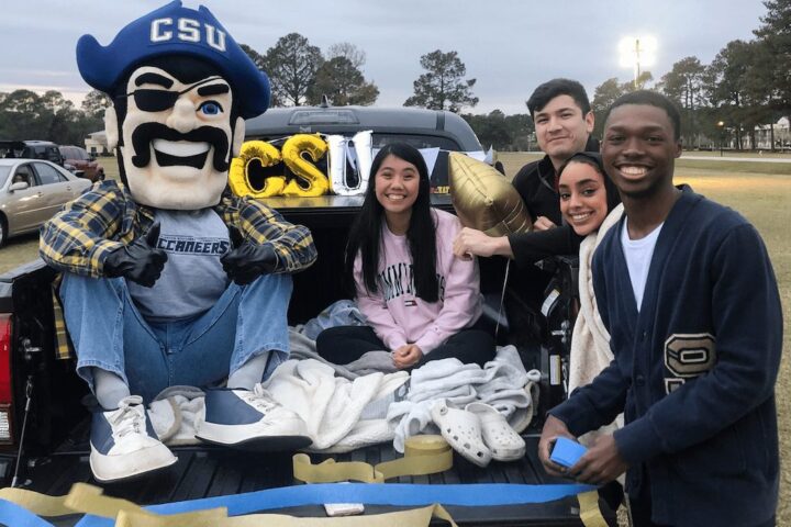Charleston Southern students hang out with Bucky at the CSU Drive In.