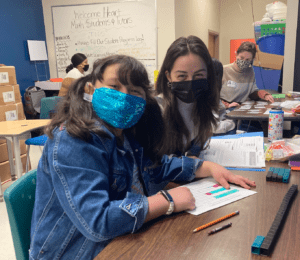 CSU student Caroline Smith with Ladson elementary student