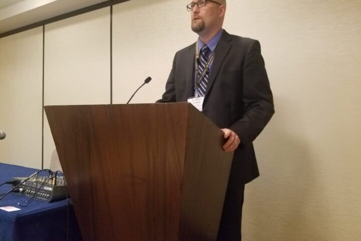 Dr. Jonathan Watson speaks on baptism at ETS Conference in 2019.